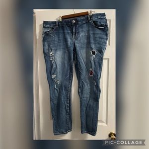 Maurices size 22 distressed skinny jeans with red plaid patch under rips